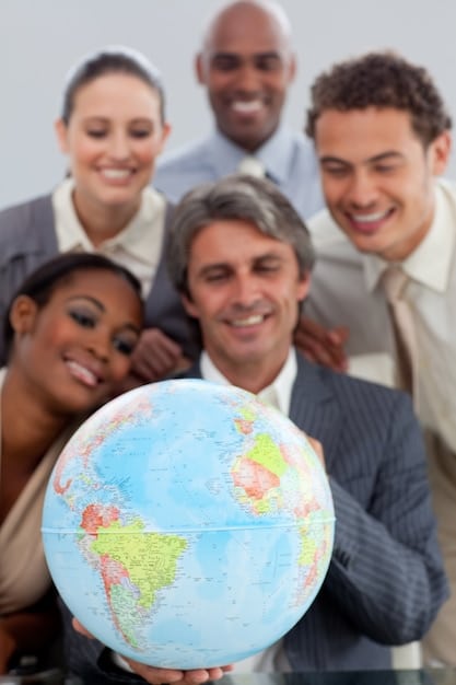 A diverse group of people from different nations collaborating around a large globe, with symbols of sustainable development and innovation interspersed, representing global cooperation on complex issues like climate change and public health.