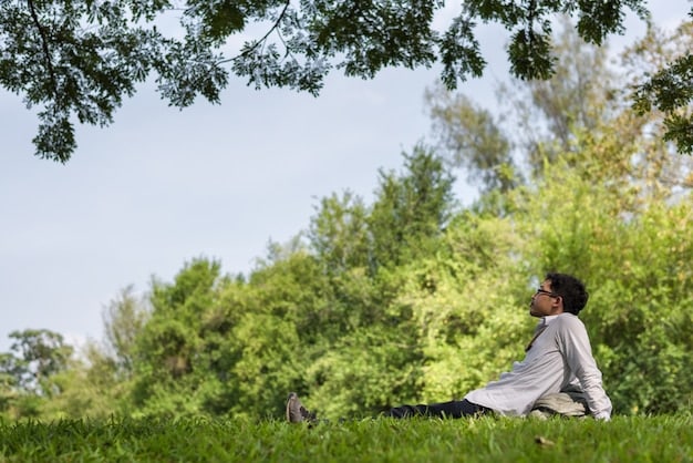 A person meditating calmly in a serene, green park, with gentle sunlight filtering through trees, symbolizing inner peace and stress reduction.