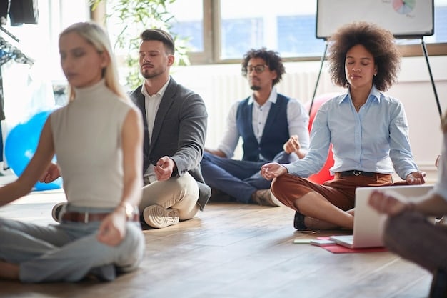 A diverse group of employees in a modern, inclusive office setting, engaged in a wellness activity like stretching or a brief mindfulness exercise, reflecting a proactive approach to wellbeing and the future of benefits.