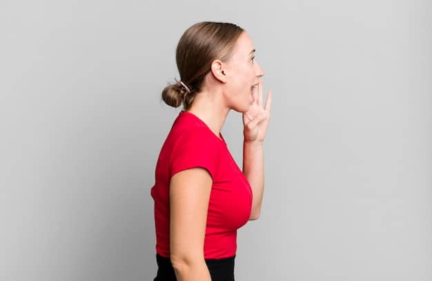 A person performing a chin tuck exercise, demonstrating correct head and neck alignment.