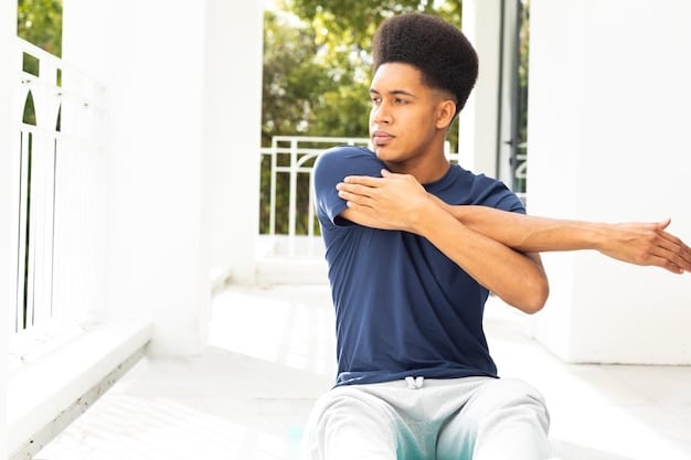 A person stretching their chest and shoulders after a period of sitting, demonstrating active postural care.