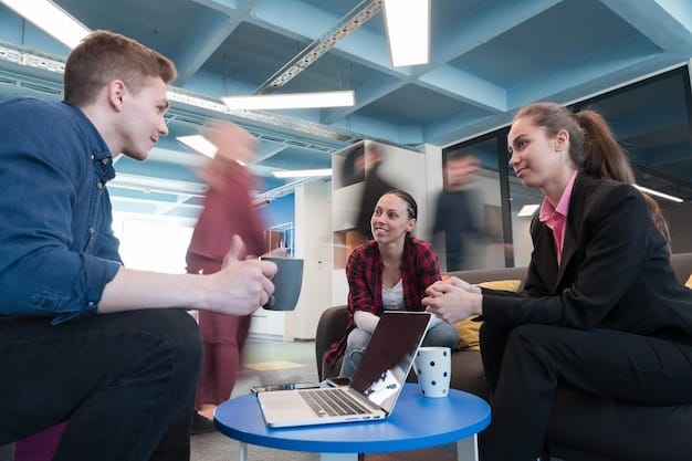A student presenting a project in a professional setting, surrounded by peers and mentors, symbolizing practical experience and networking.