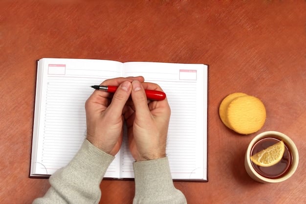 A close-up shot of a hand holding a pen, poised over a notebook filled with handwritten notes and crossed-out ideas, symbolizing the writing and revision process.