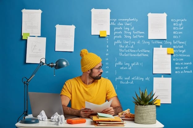 A young person at a computer, deeply focused, surrounded by books and sticky notes, suggesting active learning and skill development. The setting is modern and professional.