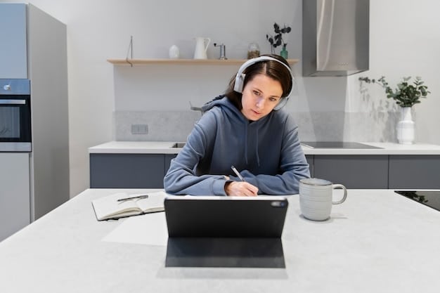 A young professional is seated at a modern desk, actively engaged in an online course on a tablet, surrounded by books and a potted plant, symbolizing continuous learning and a dynamic work environment.
