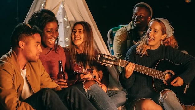 A diverse group of friends enjoying a live outdoor music concert under strung lights at night, with happy expressions and hands in the air.