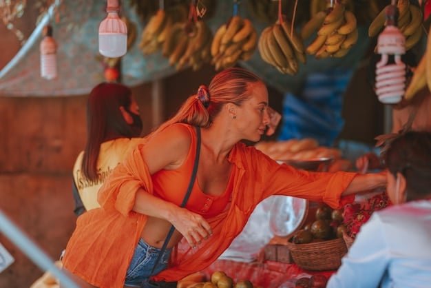 A bustling street market in a historic district, with people browsing unique artisanal crafts and food stalls, reflecting local culture and vibrant community life.