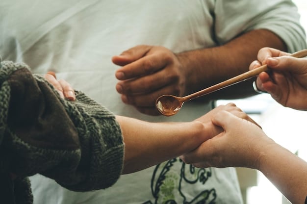 A close-up of hands exchanging handcrafted traditional goods at a market, symbolizing ethical trade and direct support for artisans.