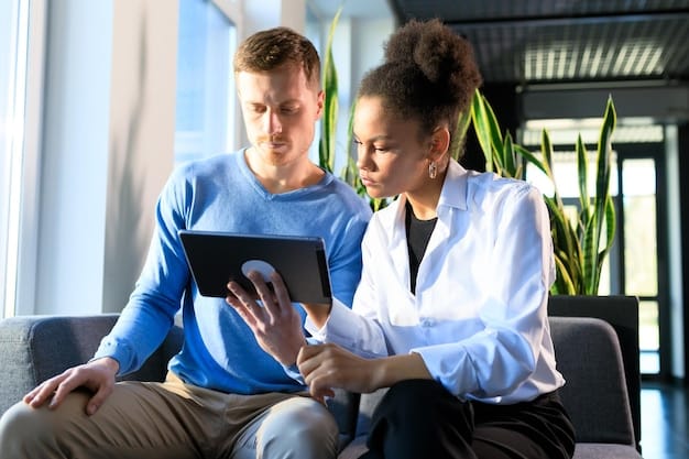 A doctor and patient reviewing a tablet together, discussing preventative health strategies in a modern, well-lit clinic.