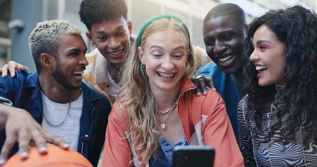 A diverse group of young adults from different countries smiling and conversing excitedly at an international student fair, representing global connections and collaborative learning opportunities.