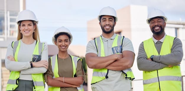 A diverse group of construction workers, both men and women, wearing hard hats and safety gear, collaborating on an active construction site with heavy machinery in the background, symbolizing job creation.